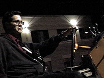 This is our roomate, Andrew, my adopted brother.